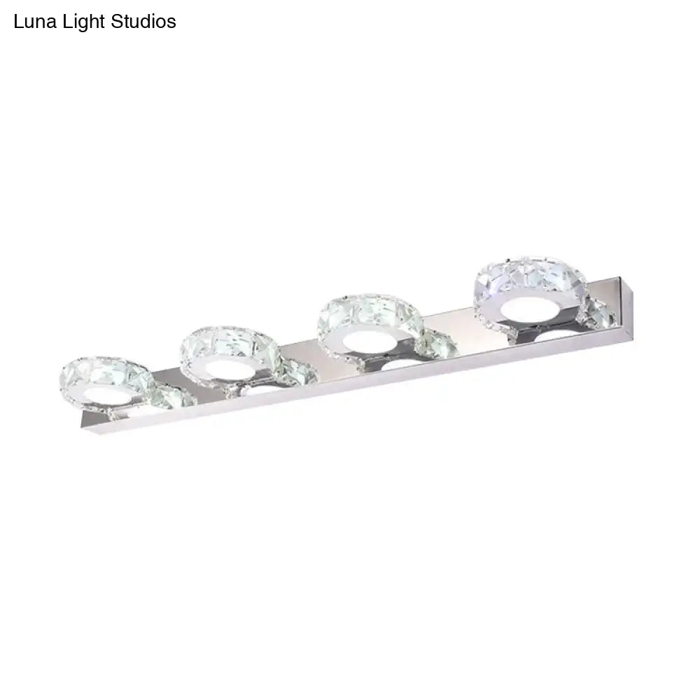 Chrome Gold Crystal Vanity Light Decorbites with four crystal rings on a rectangular bar on Tampa Home & Garden Store