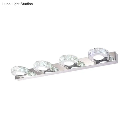 Chrome Gold Crystal Vanity Light Decorbites with four crystal rings on a rectangular bar on Tampa Home & Garden Store
