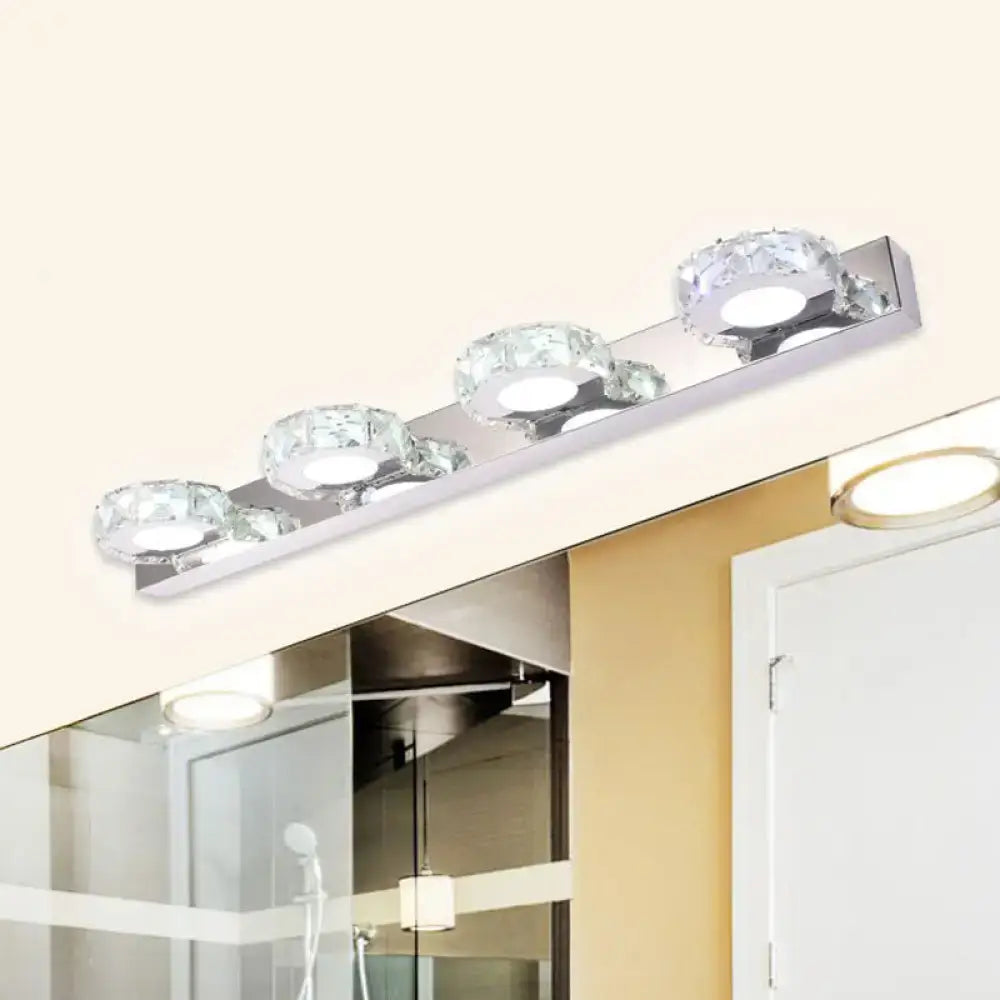 Chrome gold crystal vanity light bar by Decorbites with four crystal bulbs on a chrome finish strip on Tampa Home & Garden Store