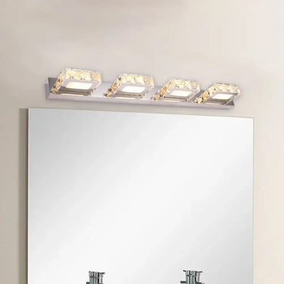 Chrome gold crystal vanity light with 3 square crystal fixtures above bathroom mirror on Tampa Home & Garden Store
