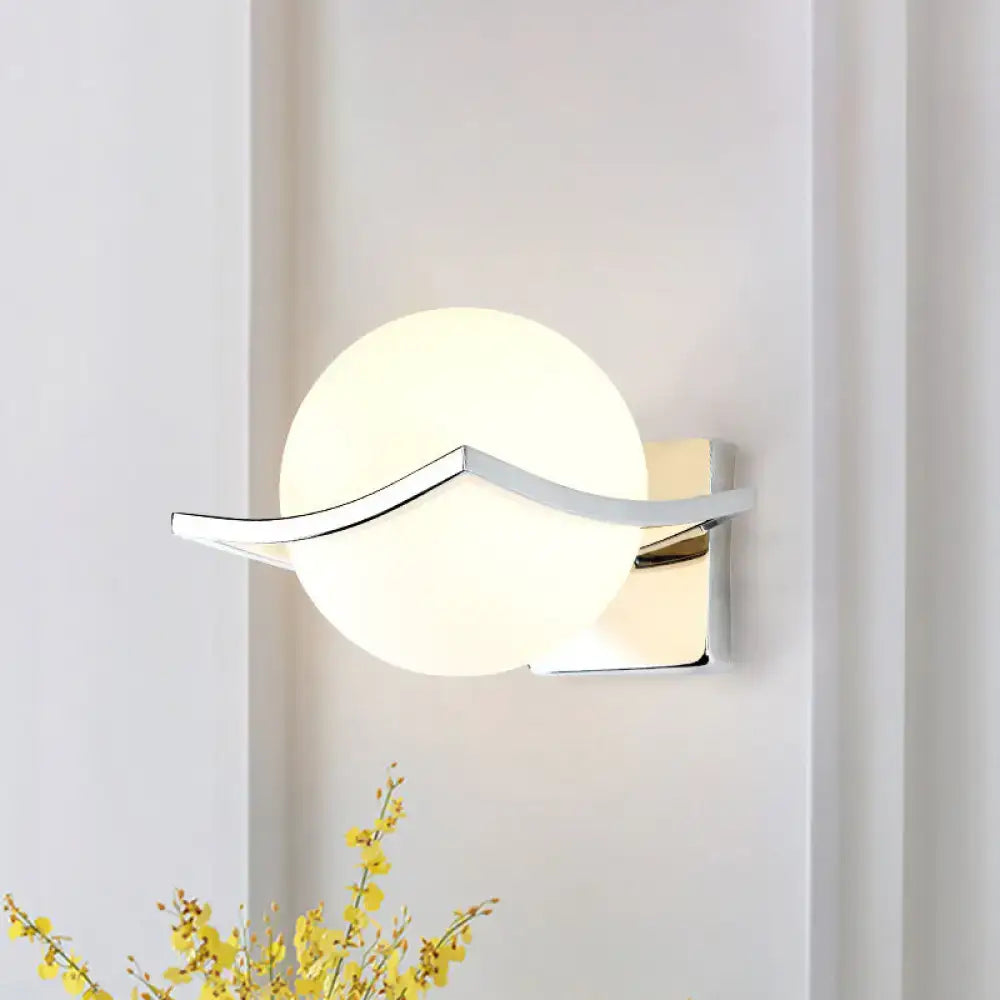 White glass globe sconce with chrome curved arm on square backplate Decorbites on Tampa Home & Garden Store