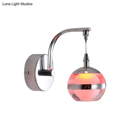 Pink glass chrome acrylic sconce with curved chrome arm and pink orb shade by Decorbites on Tampa Home & Garden Store