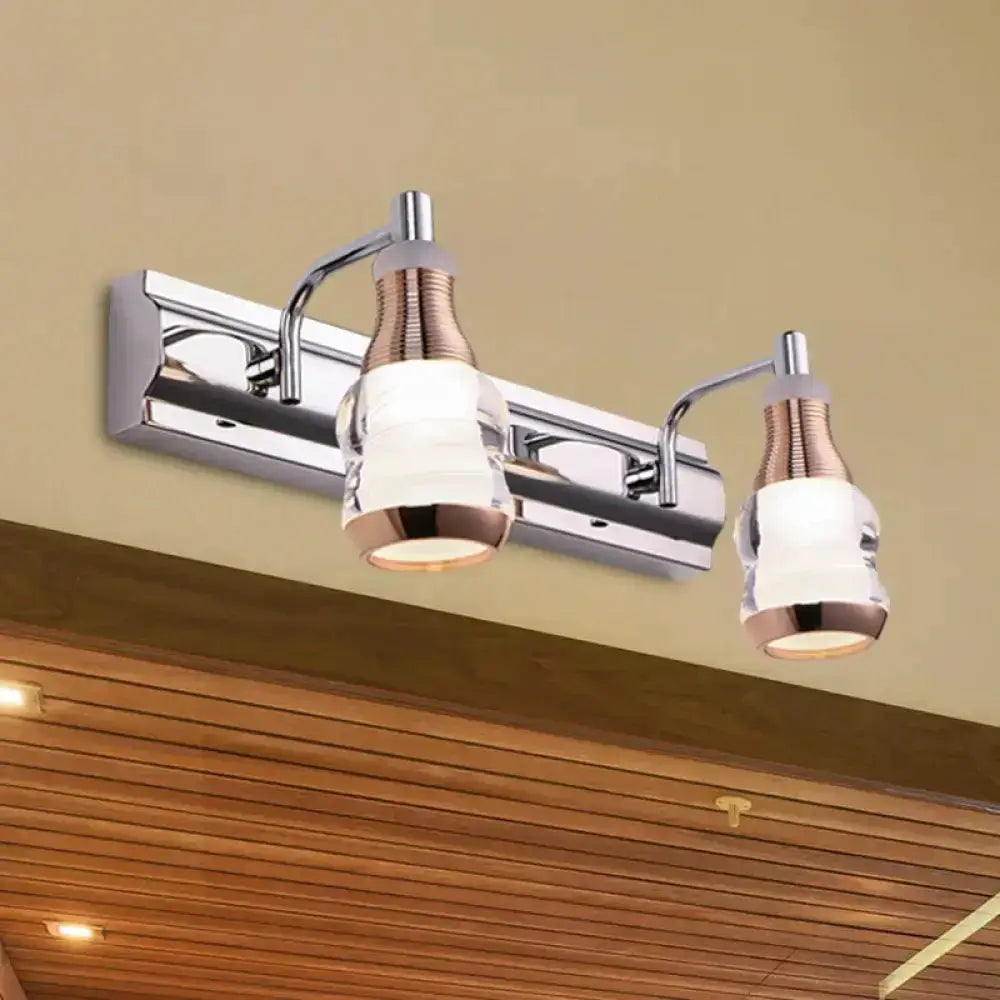 Decorbites modern chrome and rose gold two-light vanity wall fixture with glass shades on Tampa Home & Garden Store