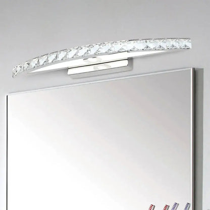 Wood LED Vanity Light curved crystal bar fixture with chrome mount above a mirror on Tampa Home & Garden Store