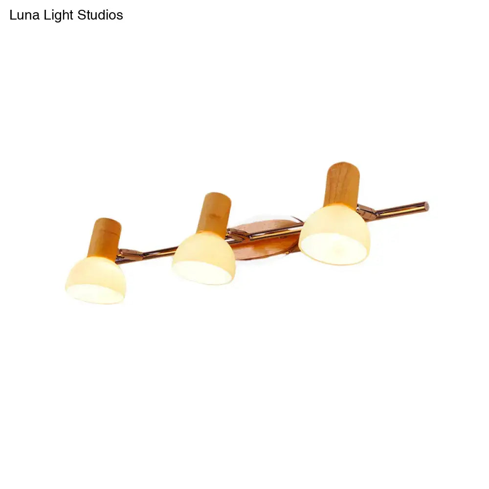 Glass Dome Vanity Sconce, 3-light brass fixture with wood accents and frosted glass domes on Tampa Home & Garden Store