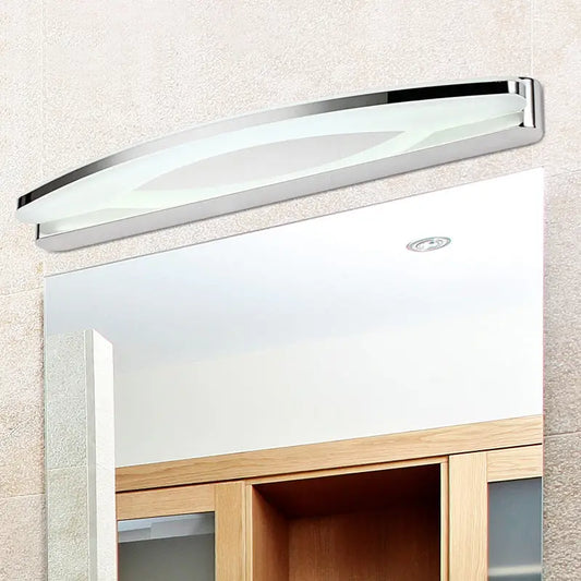 Chrome arc LED vanity light with acrylic diffuser by Decorbites above bathroom mirror on Tampa Home & Garden Store