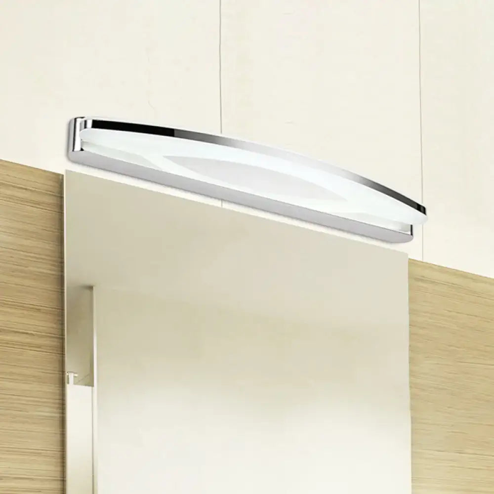 Chrome arched vanity light by Decorbites with frosted diffuser, wall-mounted above panel on Tampa Home & Garden Store