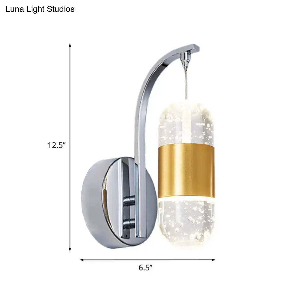 Chrome crystal bubble sconce with curved arm, glass shade and gold band on Tampa Home & Garden Store