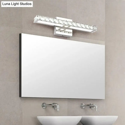 Chrome Crystal LED Bathroom Light fixture with crystal accents above mirror in a modern bathroom on Tampa Home & Garden Store