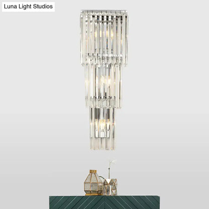 Chrome clear glass wall sconce with cascading crystal prisms by Decorbites on Tampa Home & Garden Store