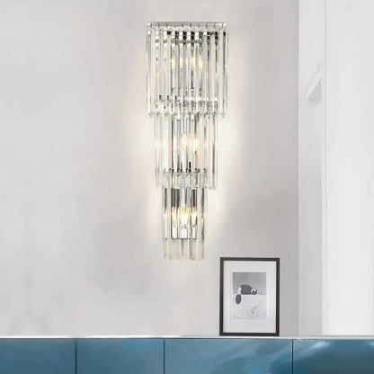Chrome clear glass wall sconce with cascading prisms by Decorbites, modern crystal lighting on Tampa Home & Garden Store