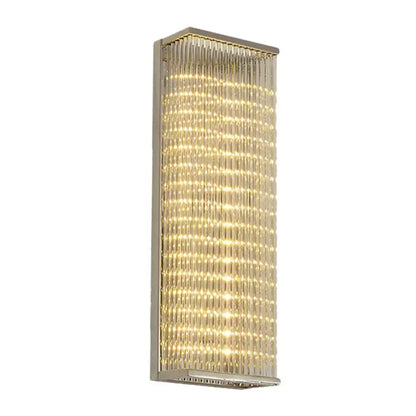 Chrome Crystal LED Wall Sconce with chrome frame and cascading crystal prisms, warm LED glow on Tampa Home & Garden Store