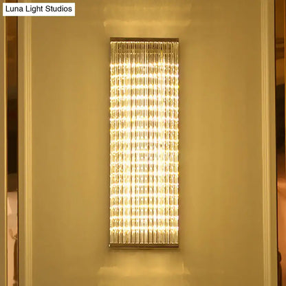 Chrome Crystal LED Wall Sconce with vertical crystal prisms and warm glow on Tampa Home & Garden Store