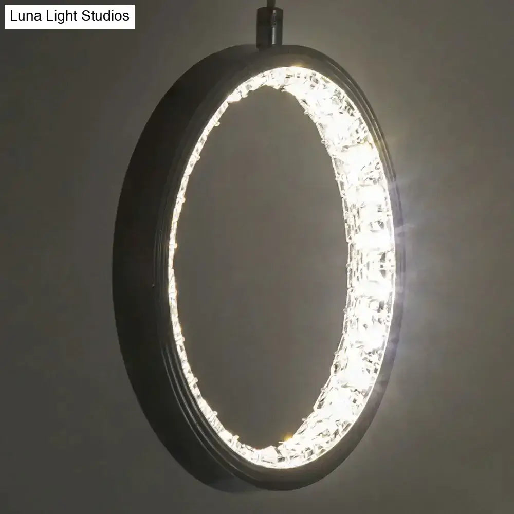 Decorbites Chrome Crystal Rings Pendant light with a circular chrome frame and crystal ring on Tampa Home & Garden Store