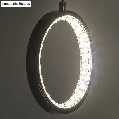 Decorbites Chrome Crystal Rings Pendant light with a circular chrome frame and crystal ring on Tampa Home & Garden Store