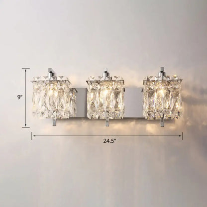 Chrome crystal three-light sconce light by Decorbites, wall mounted with hanging prisms on Tampa Home & Garden Store