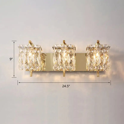 Decorbites Chrome Crystal Sconce Light with three crystal lanterns, gold-tone backplate on Tampa Home & Garden Store