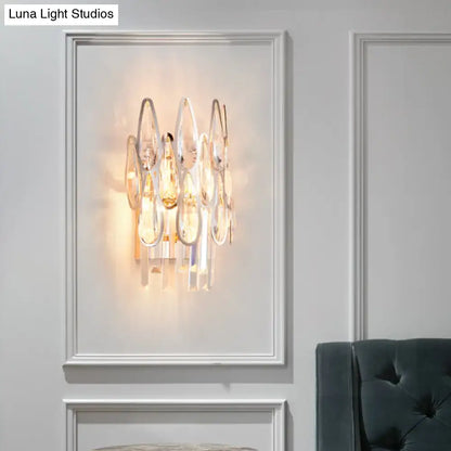 Chrome teardrop crystal sconce dimmable with multiple hanging drops by Decorbites on Tampa Home & Garden Store