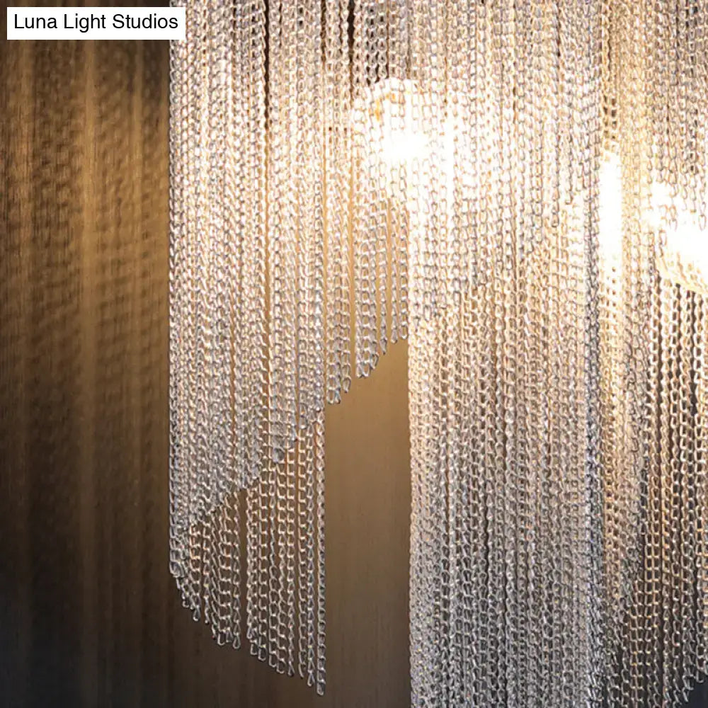 Chrome Minimalist Wall Lamp with hanging crystal bead curtains and warm glow on Tampa Home & Garden Store