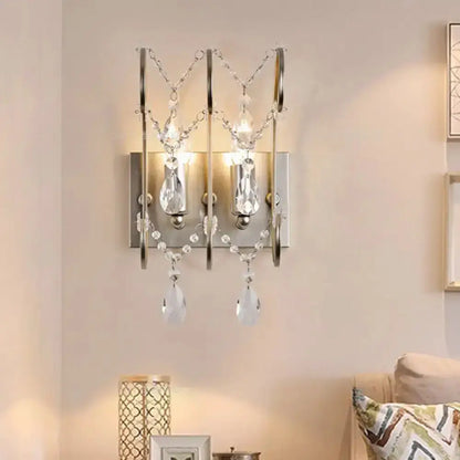 Modern chrome crystal wall sconce light by Decorbites, two-light teardrop prisms on Tampa Home & Garden Store