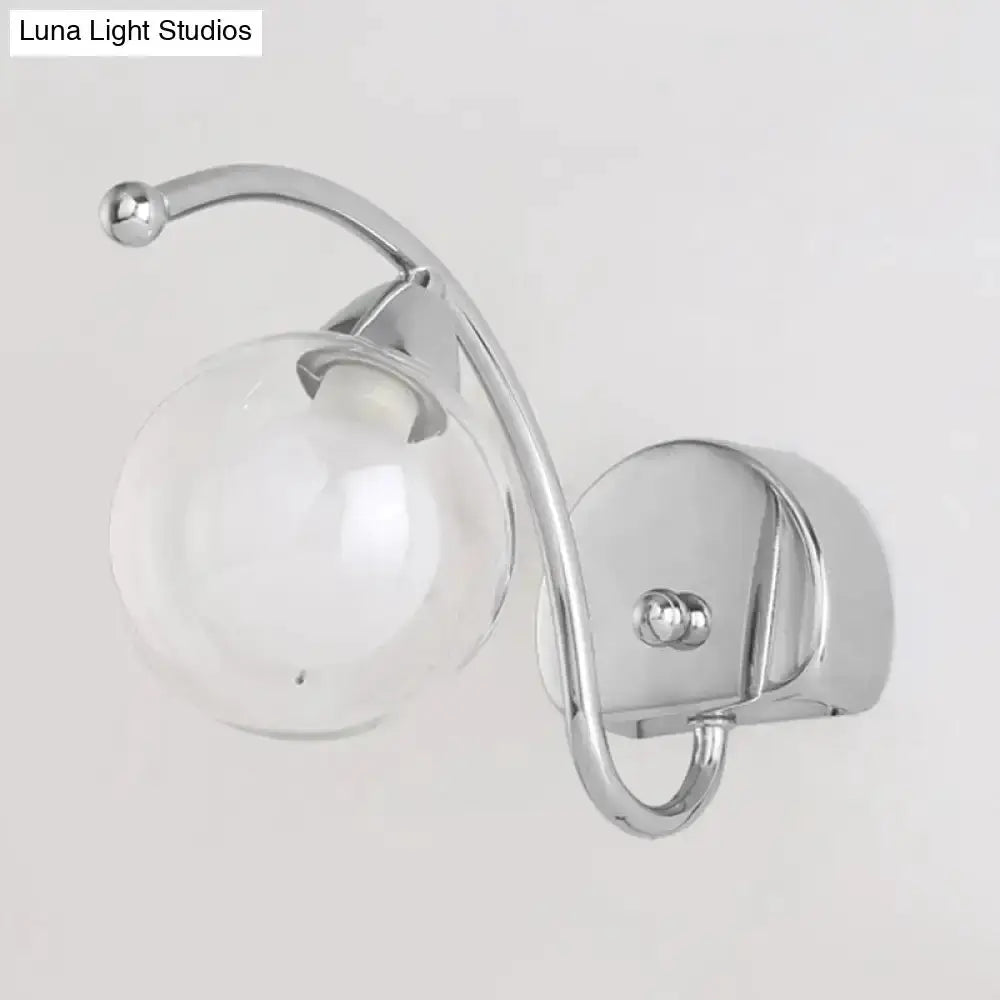 Modern chrome curved-arm wall lamp with glass globe sconce for bedroom Decorbites on Tampa Home & Garden Store