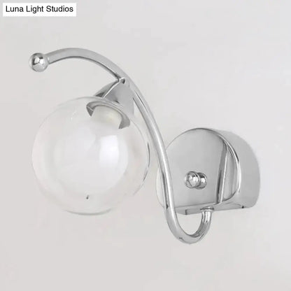 Modern chrome curved-arm wall lamp with glass globe sconce for bedroom Decorbites on Tampa Home & Garden Store