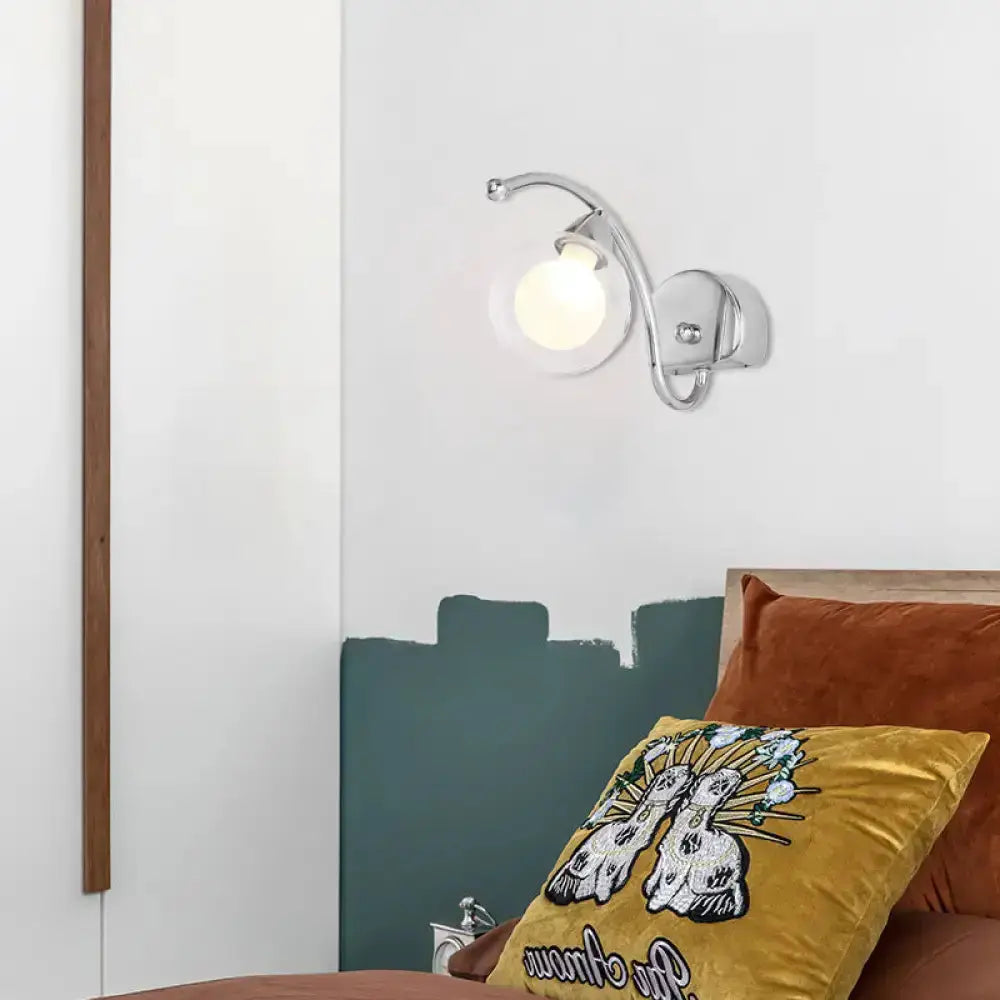 Modern chrome curved arm wall lamp with glass globe by Decorbites for bedroom on Tampa Home & Garden Store
