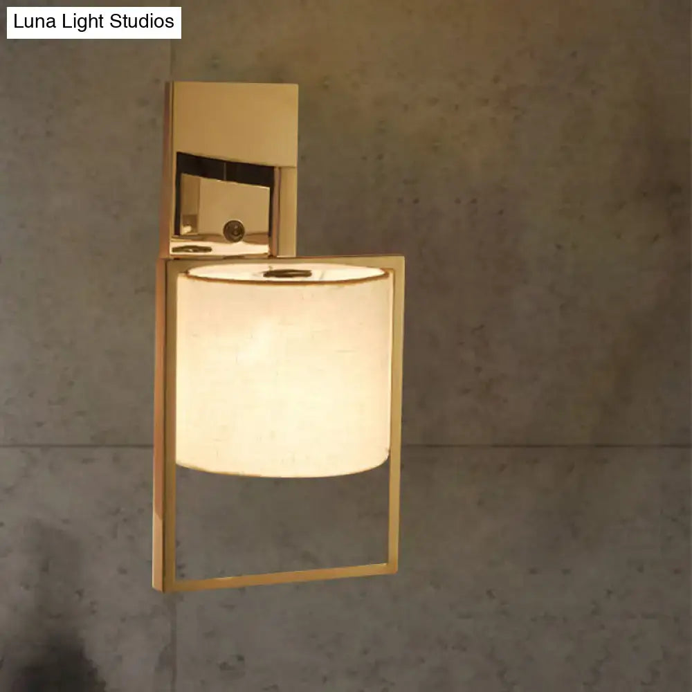 Chrome Fabric Cylinder Sconce by Decorbites with a square chrome frame and white fabric shade on Tampa Home & Garden Store