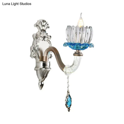 Chrome glass wall light sconce by Decorbites with backplate curved arm blue glass shade on Tampa Home & Garden Store