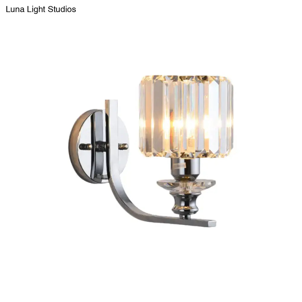 Chrome crystal living room wall sconce with curved chrome arm and faceted glass shade on Tampa Home & Garden Store