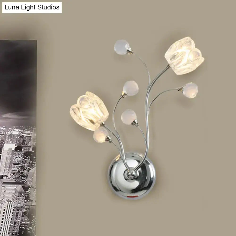 Chrome flower wall sconce with six frosted glass bulbs and curved metal stems by Decorbites on Tampa Home & Garden Store