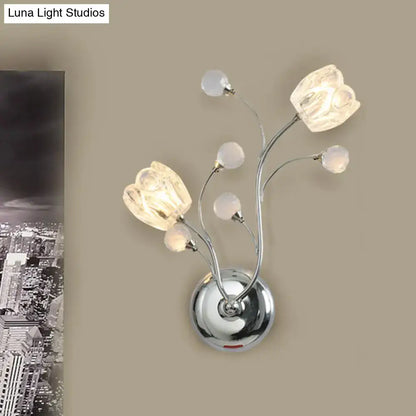 Chrome flower wall sconce with six frosted glass bulbs and curved metal stems by Decorbites on Tampa Home & Garden Store