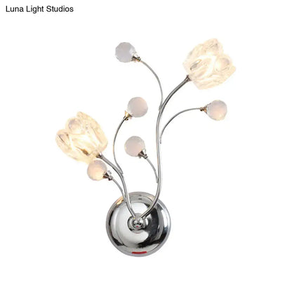 Chrome flower wall sconce with five curved stems and crystal petal bulbs on Tampa Home & Garden Store