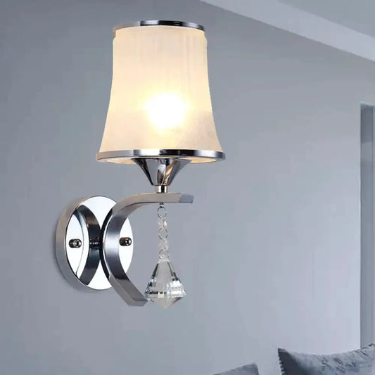Modern chrome wall sconce with frosted glass shade and hanging crystal pendant Decorbites on Tampa Home & Garden Store