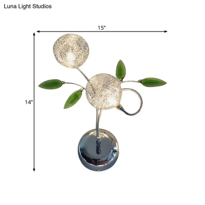 Green Crystal Leaf Sconce by Decorbites with chrome base and green glass leaves on Tampa Home & Garden Store