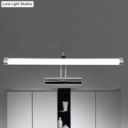 Decorbites chrome tube vanity light with frosted white tube, mounted over white cabinet vanity on Tampa Home & Garden Store