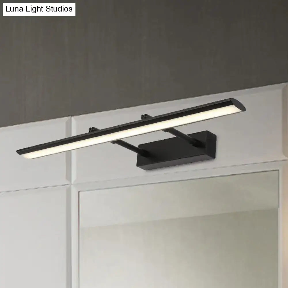 LED vanity light fixture slim bar in dark metal with frosted diffuser above bathroom mirror on Tampa Home & Garden Store