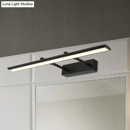 LED vanity light fixture slim bar in dark metal with frosted diffuser above bathroom mirror on Tampa Home & Garden Store