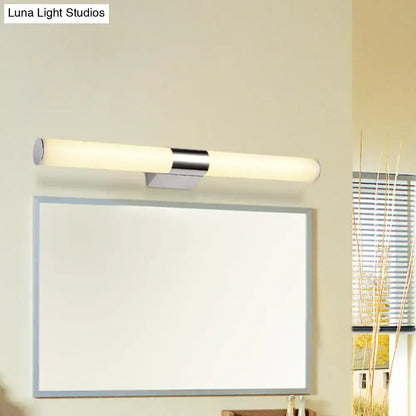 Chrome cylindrical vanity light, wall-mounted with frosted diffusers above mirror on Tampa Home & Garden Store