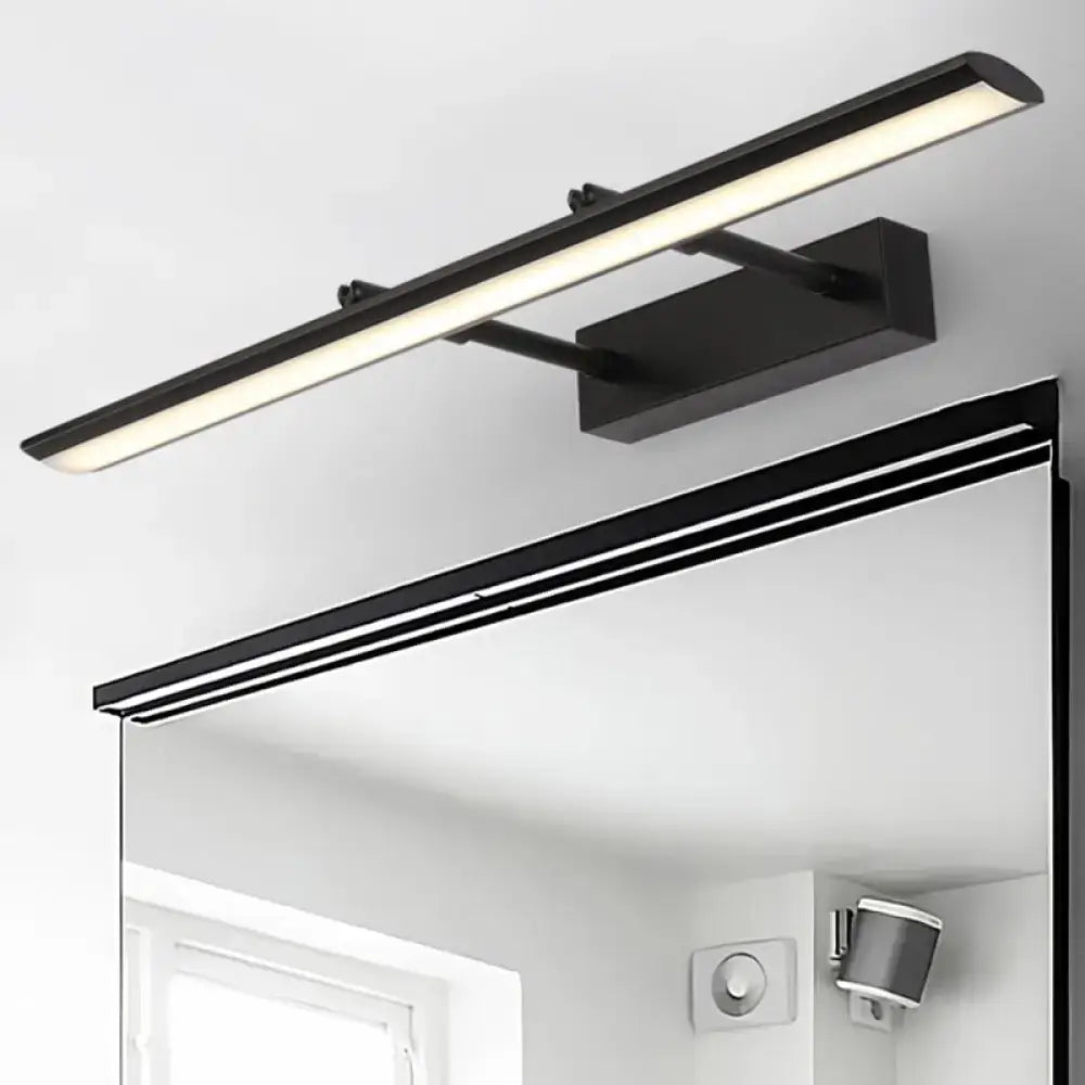 Decorbites chrome adjustable joint sconce with long bar light above mirror on Tampa Home & Garden Store