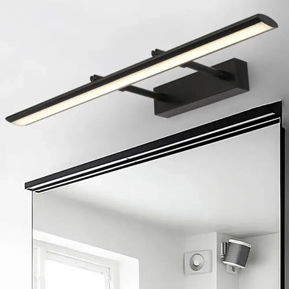 Decorbites chrome adjustable joint sconce with long bar light above mirror on Tampa Home & Garden Store