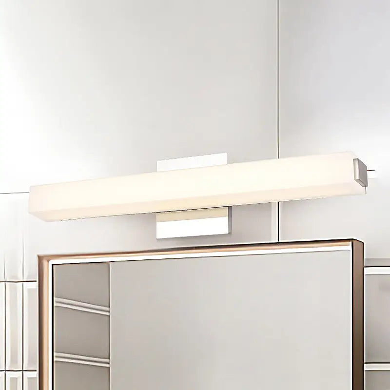 Chrome rectangular wall sconce with frosted shade, warm white glow by Decorbites on Tampa Home & Garden Store