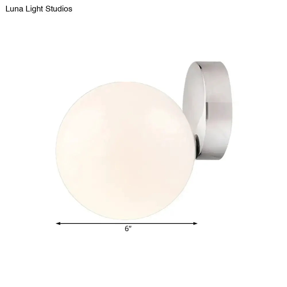 Modern chrome milk glass globe wall lamp for living room by Decorbites on Tampa Home & Garden Store