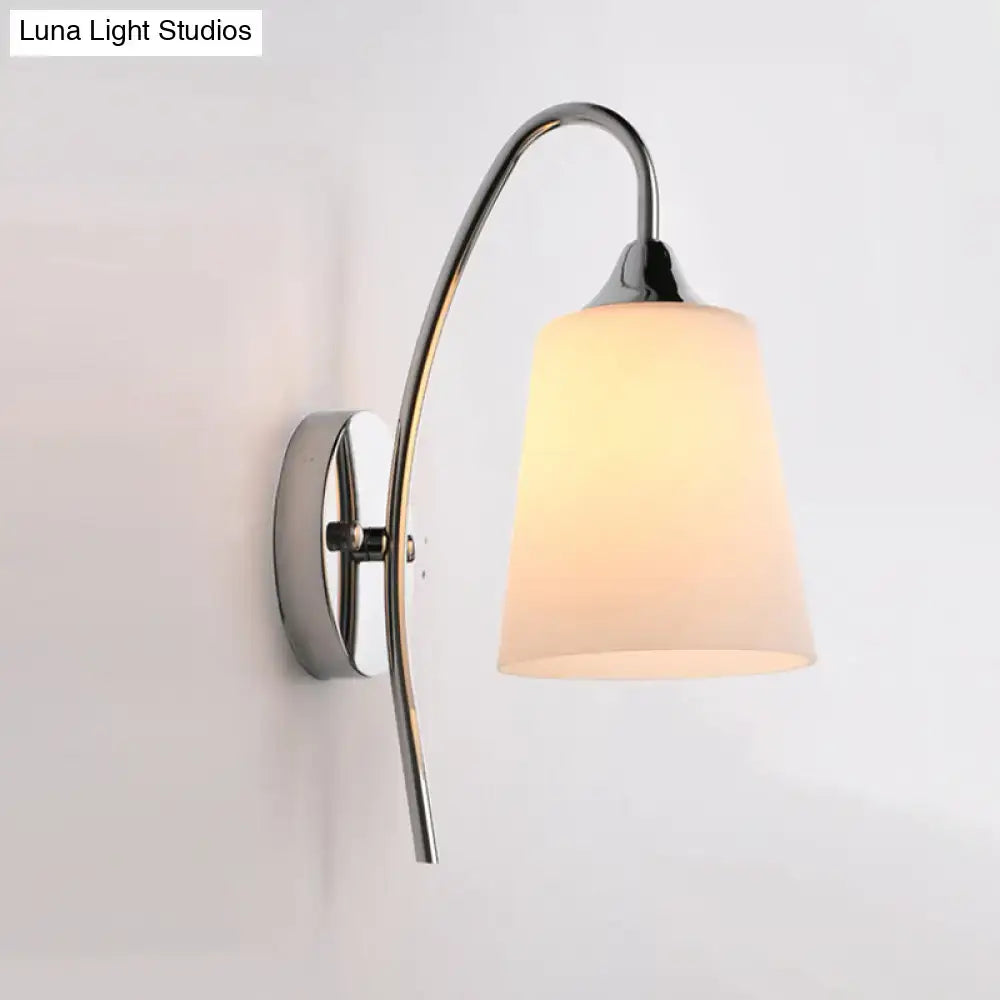 Chrome Milky Glass Wall Sconce with a curved chrome arm and milky shade by Decorbites on Tampa Home & Garden Store