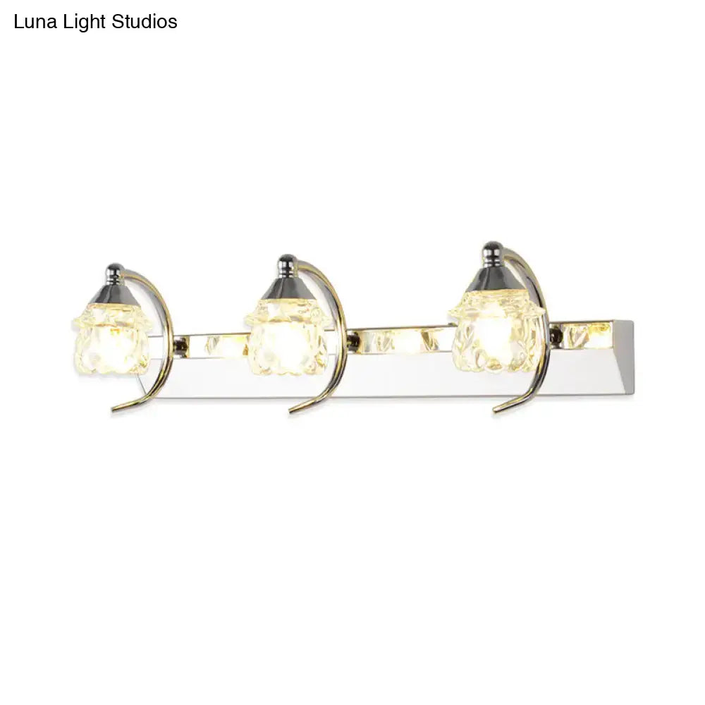 Chrome crystal vanity light 3-light fixture with faceted glass shades and curved supports on Tampa Home & Garden Store