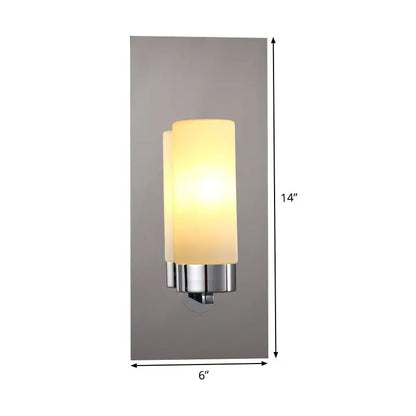 Decorbites Chrome Opal Tube Sconce with frosted glass cylinder shade on chrome backplate on Tampa Home & Garden Store