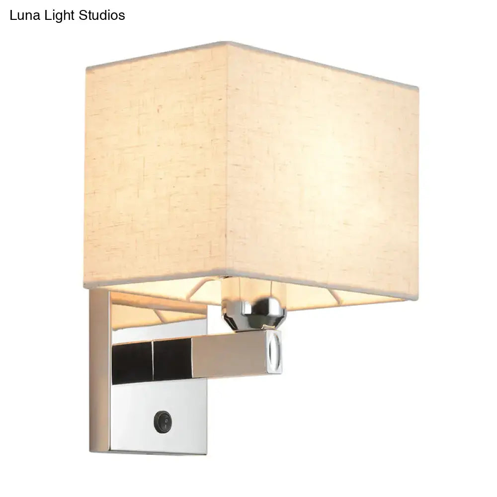 Chrome rectangle wall sconce with beige linen shade and chrome backplate on Tampa Home & Garden Store