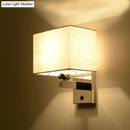 Chrome rectangle wall sconce with beige fabric shade and chrome mounting arm by Decorbites on Tampa Home & Garden Store