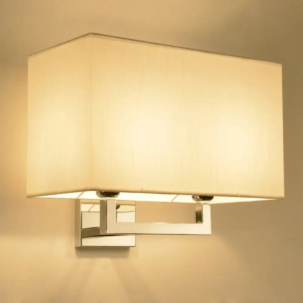 Chrome fabric wall sconce by Decorbites with a square cream shade, wall-mounted on Tampa Home & Garden Store