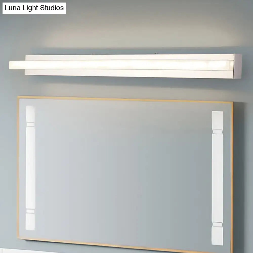 Chrome LED bathroom sconce by Decorbites, slim horizontal wall light above a framed mirror on Tampa Home & Garden Store